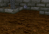 Ultima Underworld (PSX) screenshot: missing nightstand can support items - notice floating buckler