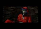 Hi-res graphic of a man in red robes lying against a brick wall.